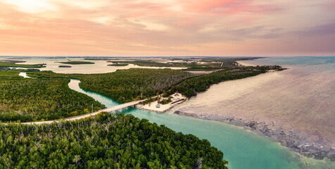 Aerial sunset with the bridge between Sugarloaf and Saddlebunch Keys, above Sugarloaf Creek, in Florida Keys, Florida. - obrazy, fototapety, plakaty