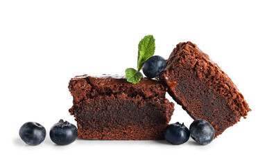Pieces of tasty chocolate brownie with blueberry isolated on white background