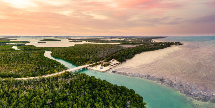 Aerial sunset with the bridge between Sugarloaf and Saddlebunch Keys, above Sugarloaf Creek, in Florida Keys, Florida.
