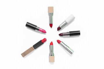 Obraz premium Frame made of lipsticks on white background