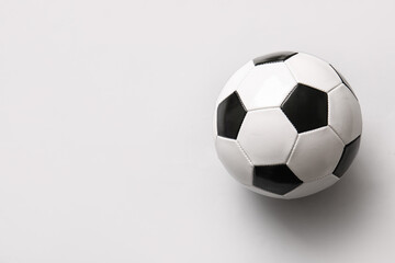 Fototapeta na wymiar Soccer ball on light background