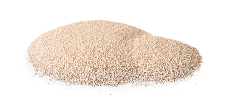 Heap of active dry yeast isolated on white