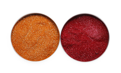 Bowls with food coloring on white background, top view