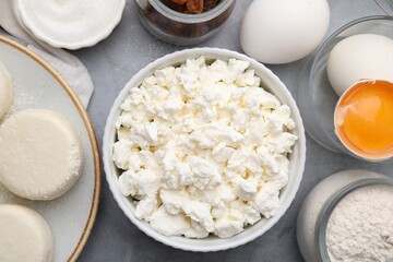 Different ingredients on light grey table, flat lay. Cooking cottage cheese pancakes