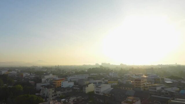 time lapse of storm skies at sunrise over the city, Sky and blue sky moving on community in a valley.