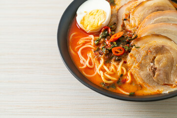 Ramen Noodles Spicy Tomyum Soup with Roast Pork