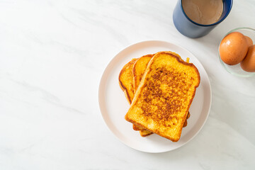 french toast on white plate