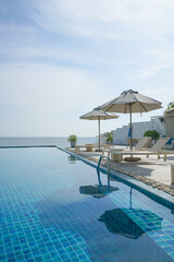 bed pool around swimming pool with sea background
