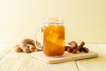 Delicious sweet drink tamarind juice and ice cube