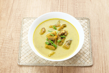 Empal Gentong Cirebon, traditional beef soup with coconut milk. Indonesian food
