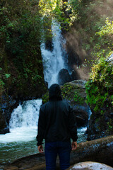 person in the waterfall