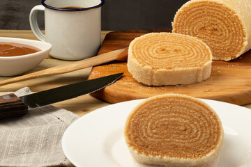 Brazilian typical dessert roll cake .