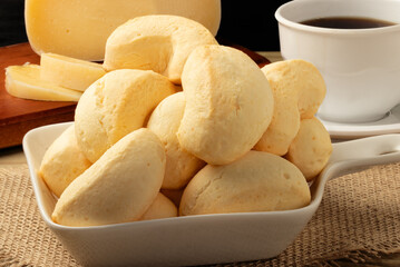 Brazilian cheese biscuit on plate. Selective focus.
