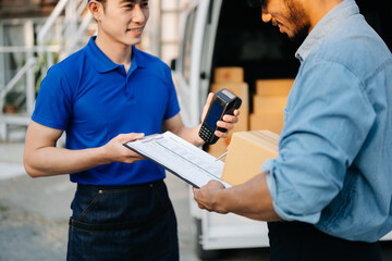 Parcel delivery and a name tag is delivering parcels to a client. Friendly worker, high quality delivery service. and shipping ..