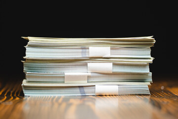 Big pile of money dollars, Pile with American one hundred dollar bills, Bank employees sorting and counting money inside bank vault. Large amounts of money in the bank.