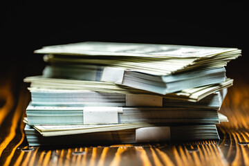 Big pile of money dollars, Pile with American one hundred dollar bills, Bank employees sorting and counting money inside bank vault. Large amounts of money in the bank.