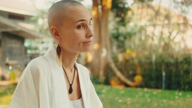 Bald fortune teller reading tarot cards