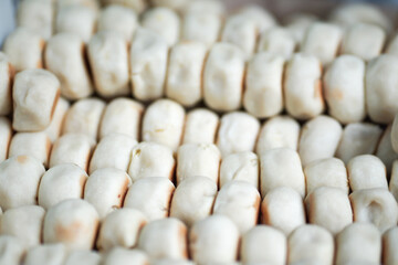 Bakpia, Bakpia Pathok is a typical Yogjakarta food made from a mixture of green beans, cheese and sugar, which is wrapped in flour, then baked. Selective focus image.