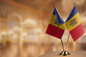 A small Moldavia flag on an abstract blurry background