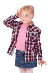 Studio shot portrait of thoughtful little girl who is eavesdropping. Copy space on white background.