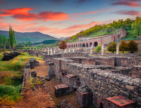 Sunset in Bitola town, North Macedonia, Europe. Exciting spring view of archaeological site - Heraklea Lynkestis. Historical site with ruins of Heraclea city. Architectural background..