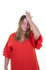 frustrated young curvy blonde woman hand on forehead on white background