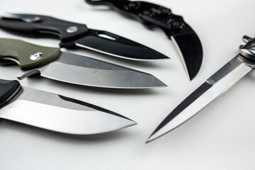 four karambit knife isolated on white