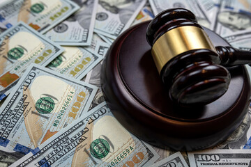 100 dollar bills with judge hammer
