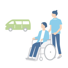 車椅子の女性を送迎する介護福祉士