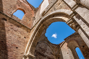 Fototapeta na wymiar Ancient cathedral with towering walls in Tuscany, Italy