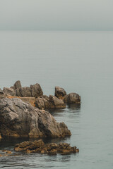 Kvarner gulf of Adriatic sea rocky shoreline with ocean water as copy space