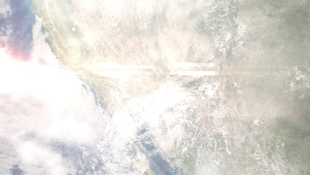 Earth zoom in from outer space to city. Zooming on Goodyear, Arizona, USA. The animation continues by zoom out through clouds and atmosphere into space. Images from NASA