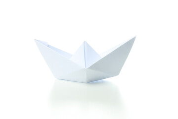 Concept of travel and adventure with paper boat, isolated on white background