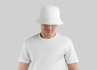 White panama template for sun protection, fashion accessory on smiling man in t-shirt, isolated on background.