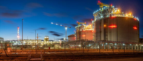LNG storage tank at night-panorama. - 585676182