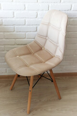 Beautiful upholstered chair with wooden legs
