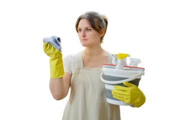 A woman with a bucket and a rag while cleaning in the home kitchen, a housewife is doing household chores