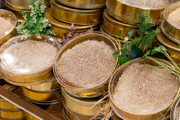 Packaged hive honey. Packaged organic honey in the deli section