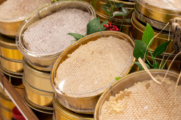 Packaged hive honey. Packaged organic honey in the deli section