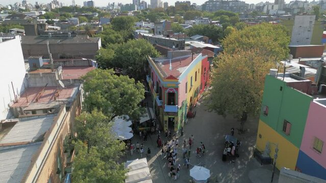 Aerial Drone Fly Above Caminito Traditional Street La Boca Buenos Aires Argentina Brightly painted Colorful Houses