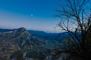 Night view of a village in the Caucasus mountains.