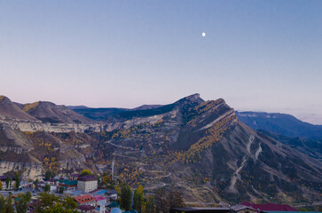 Night view of a village in the Caucasus mountains.