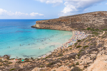 Obraz premium Isola dei Conigli (Rabbit Island) and its beautiful beach with turquoise sea water. Lampedusa, Sicily, Italy.