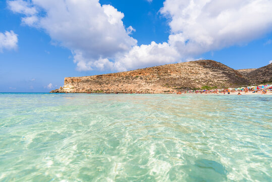 Isola dei Conigli (Rabbit Island) and its beautiful beach with turquoise sea water. Lampedusa, Sicily, Italy.