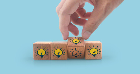 Wooden cubes in hand with copy space for input wording and infographic