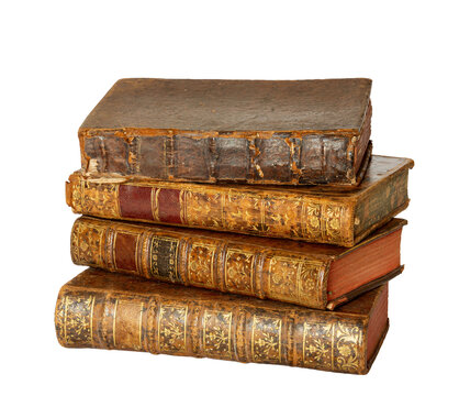 Pile of antique books with a leather cover and golden ornaments on white - Powered by Adobe