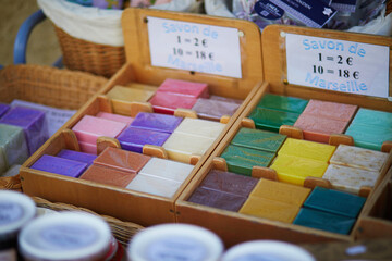 Colorful bars of Marseille soap on market or in souvenir shop