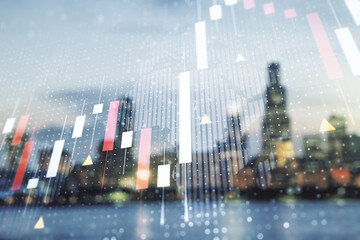Multi exposure of virtual abstract financial graph hologram and world map on blurry skyscrapers background, financial and trading concept