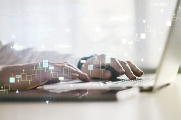Abstract creative financial graph with world map and hands typing on laptop on background, financial and trading concept. Multiexposure