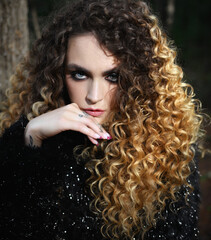 Portrait of young beautiful woman. Natural light. Shallow depth of field.